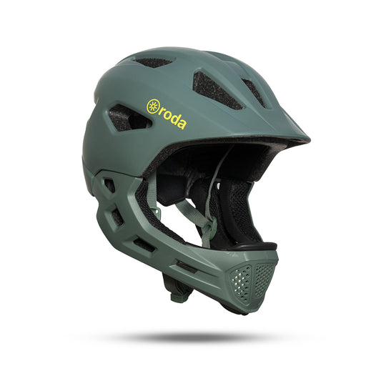 Casco integral de bicicletas para niños, de color verde, ajustable, con espuma poliestireno para los pequeños de casa.